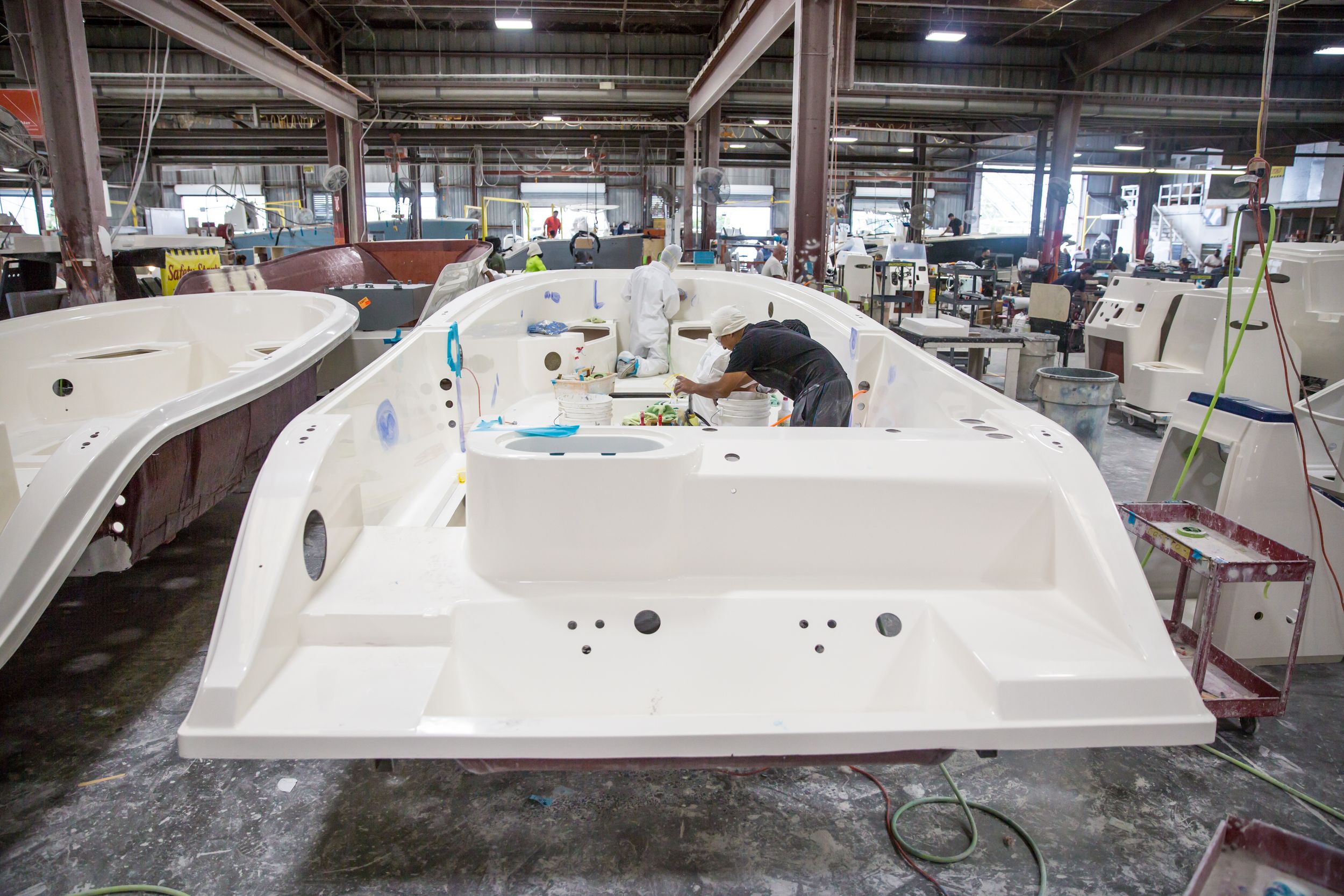 Maverick boat group manufacturer working on almost complete boat.